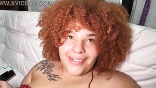 Redhead pornstar in shower, dancing sensually at carnival, revealing her natural tits and desires.